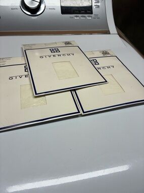 Vintage Givenchy three pair white pantyhose new in package